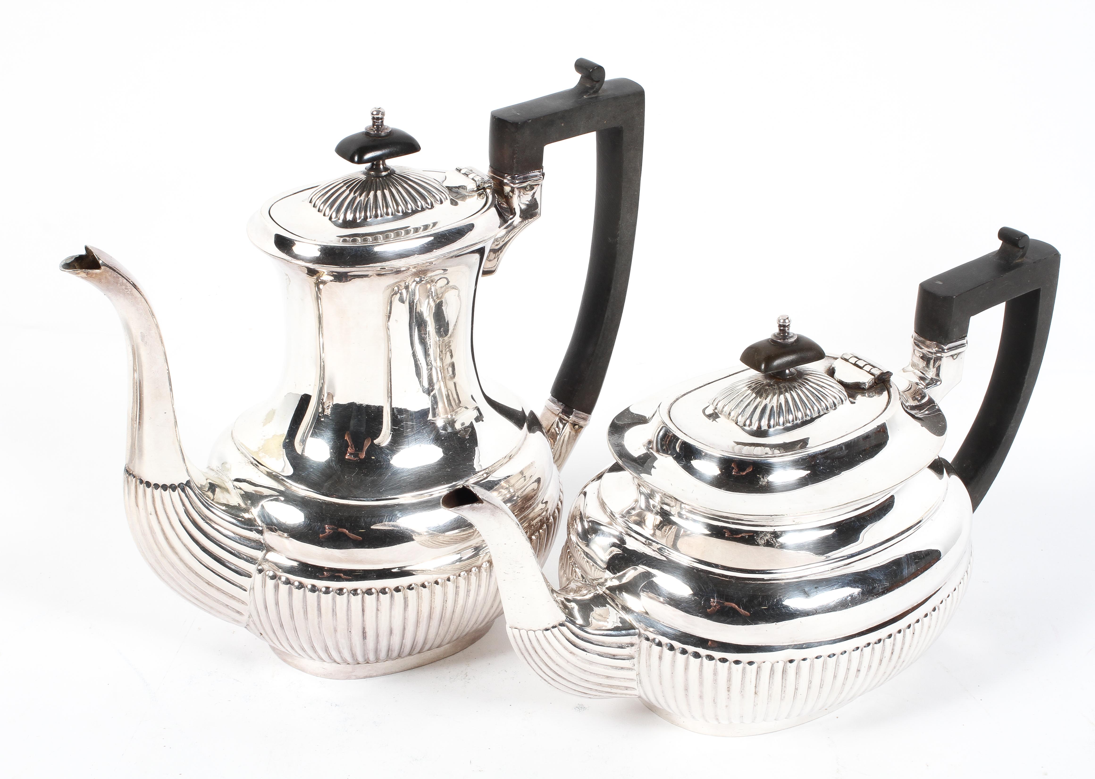 An Edwardian four piece EPNS tea service, in the Georgian style, of reeded form, - Image 2 of 2