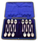 A cased set of twelve silver teaspoons, rat tail pattern, hallmarked Sheffield 1934,