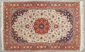 A Kashan style carpet,