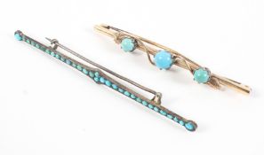 A collection of two bar brooches each set with cabochon turquoise (untested) One tests as gold.