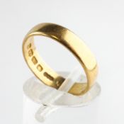 A yellow metal 4.2mm D shape wedding ring. Hallmarked 22ct gold, Birmingham, 1892. Size: K