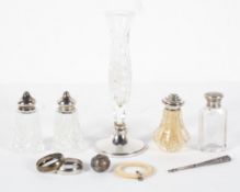 A collection of silver mounted items, including: a spill vase and other items