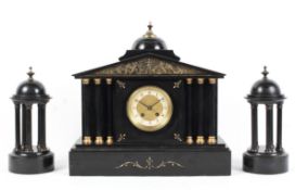 A Victorian black marble mantle clock garniture,