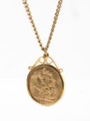 An 1890 full sovereign mounted in a 9ct gold scroll mount suspended from a 9ct gold 24 inch chain