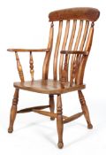 An elm kitchen armchair, 19th century, stamped HB 77 to reverse, with curved pierced vertical back,