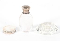 A silver mounted engraved glass scent bottle,