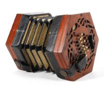 A mahogany concertina by Barnett Samuel and Sons, with fretwork decoration,