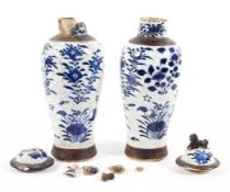 A pair of Chinese baluster blue and white craquelure vases and covers, 19th century,
