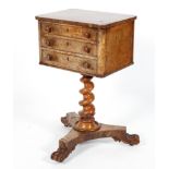 A Victorian walnut small chest of drawers, with three short drawers,