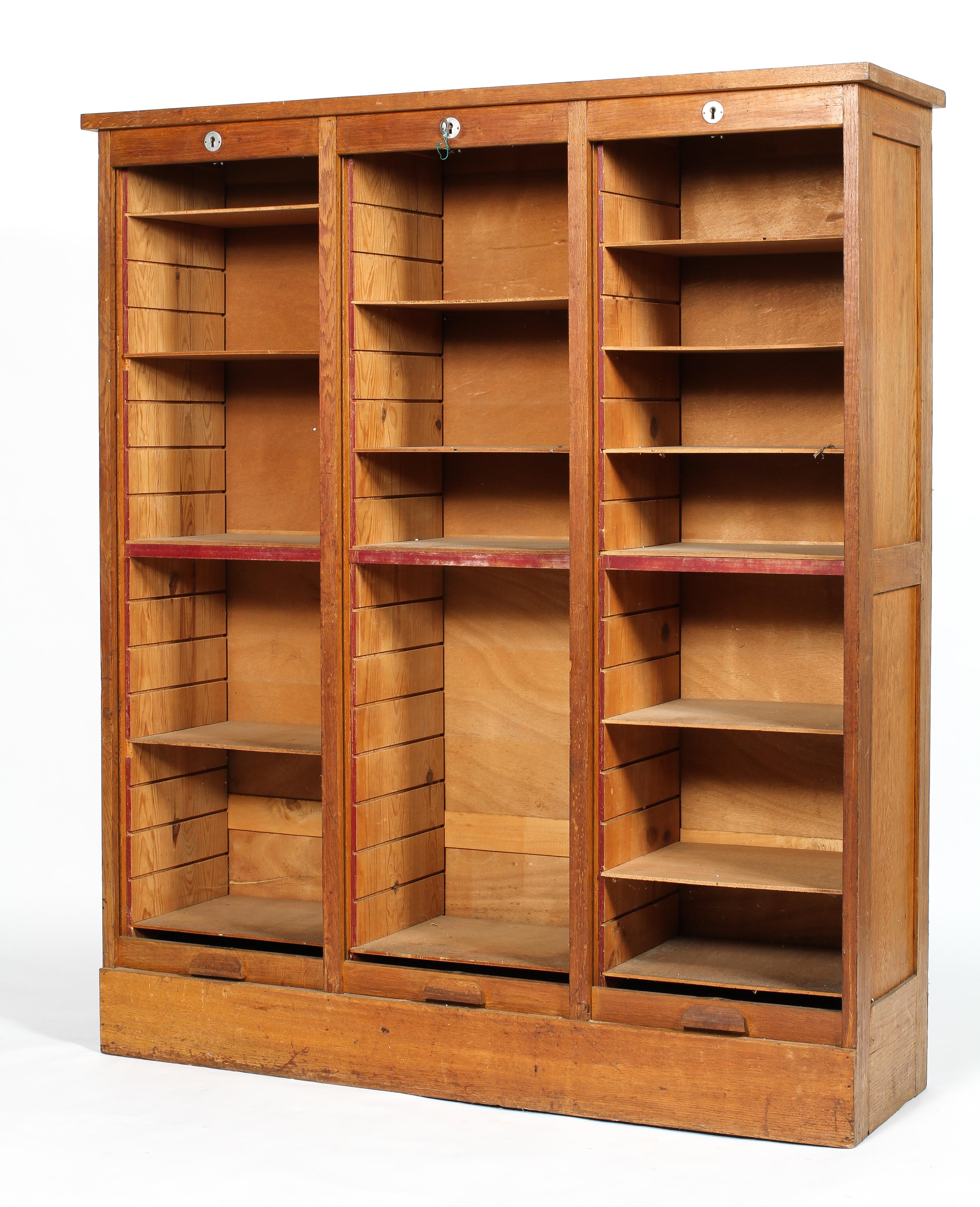An oak mid-century three section tambour filing cabinet, enclosing adjustable shelves, - Image 2 of 2