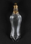 A French glass, yellow metal mounted scent bottle, of waisted form,