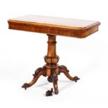 A Victorian rosewood folding card table, with moulded sliding top above concealed two part drawer,