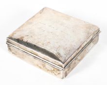 A silver cigarette box and hinged cover of square form, hallmarked for Birmingham, 1911,