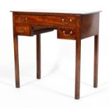A George III mahogany desk, with freize drawer above two smaller drawers, with brass swing handles,