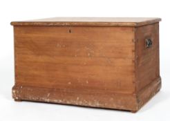 A pine blanket box with hinged cover, internal candle box and handles,