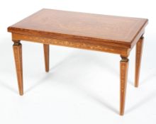 A George III style marquetry inlaid coffee table, 20th century, of rectangular form,