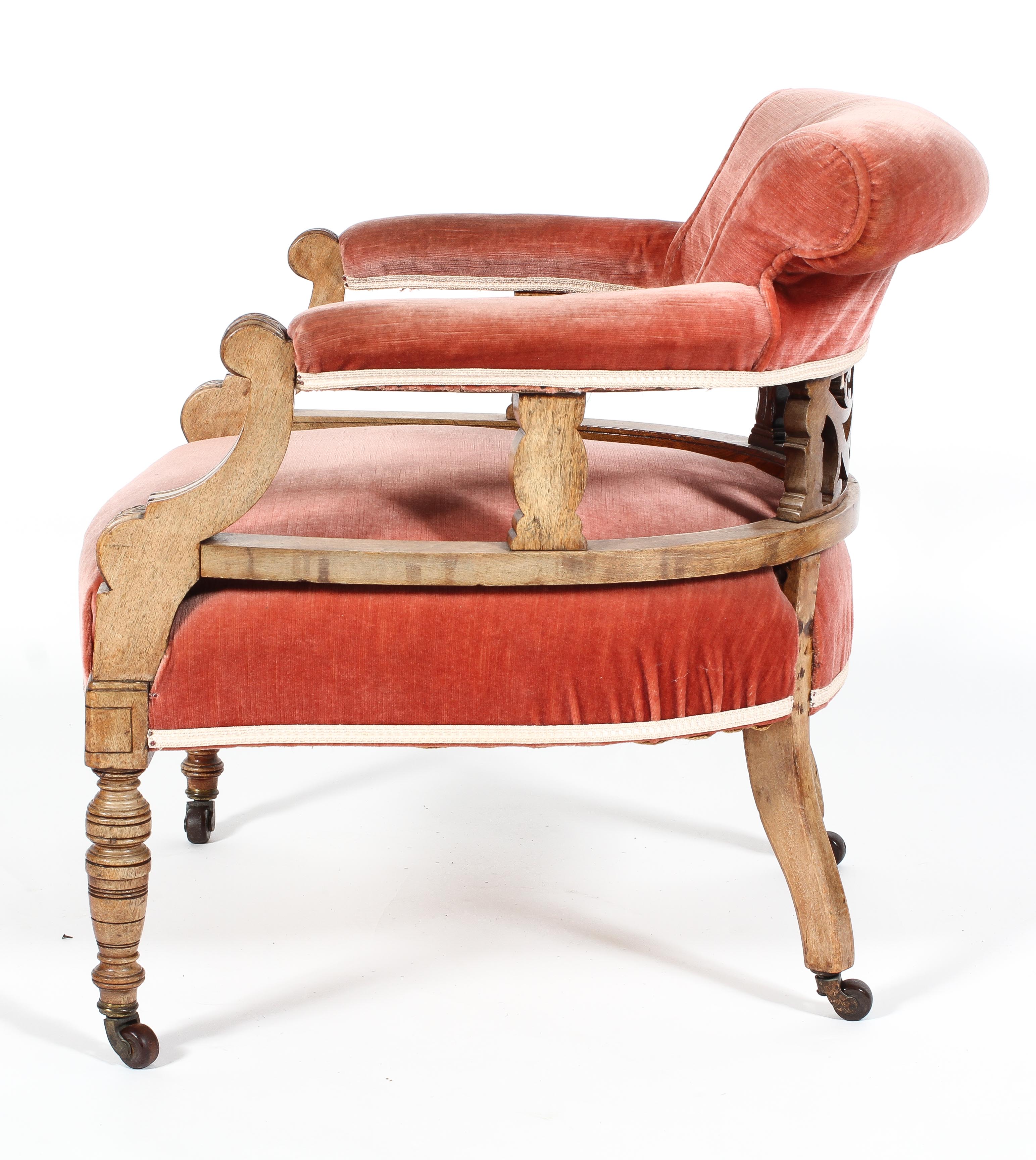 A Victorian oak framed bedroom armchair upholstered in pink velvet, late 19th century, - Image 2 of 2