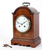 An Edwardian mahogany mantel clock in the George III style,