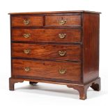 A George III mahogany chest of drawers, with two short drawers above three graduated drawers,