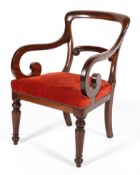 A Victorian mahogany armchair, late 19th century, with scroll carved back and arms,