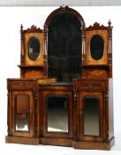 A Victorian walnut, inlaid and marble mounted reverse breakfront cabinet, the central,