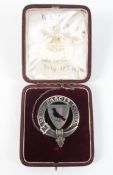 An early 20th century white metal Coat of Arms brooch,