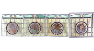 Four late 19th/early 20th century stained and leaded glass panels,