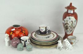 A Poole Pottery vase together with a Royal Worcester cup and assorted plates, vases and figures