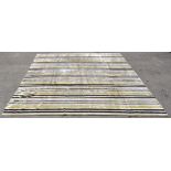 A 'Rug company' rug, with a striped design in black,