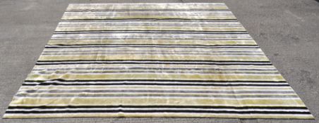 A 'Rug company' rug, with a striped design in black,