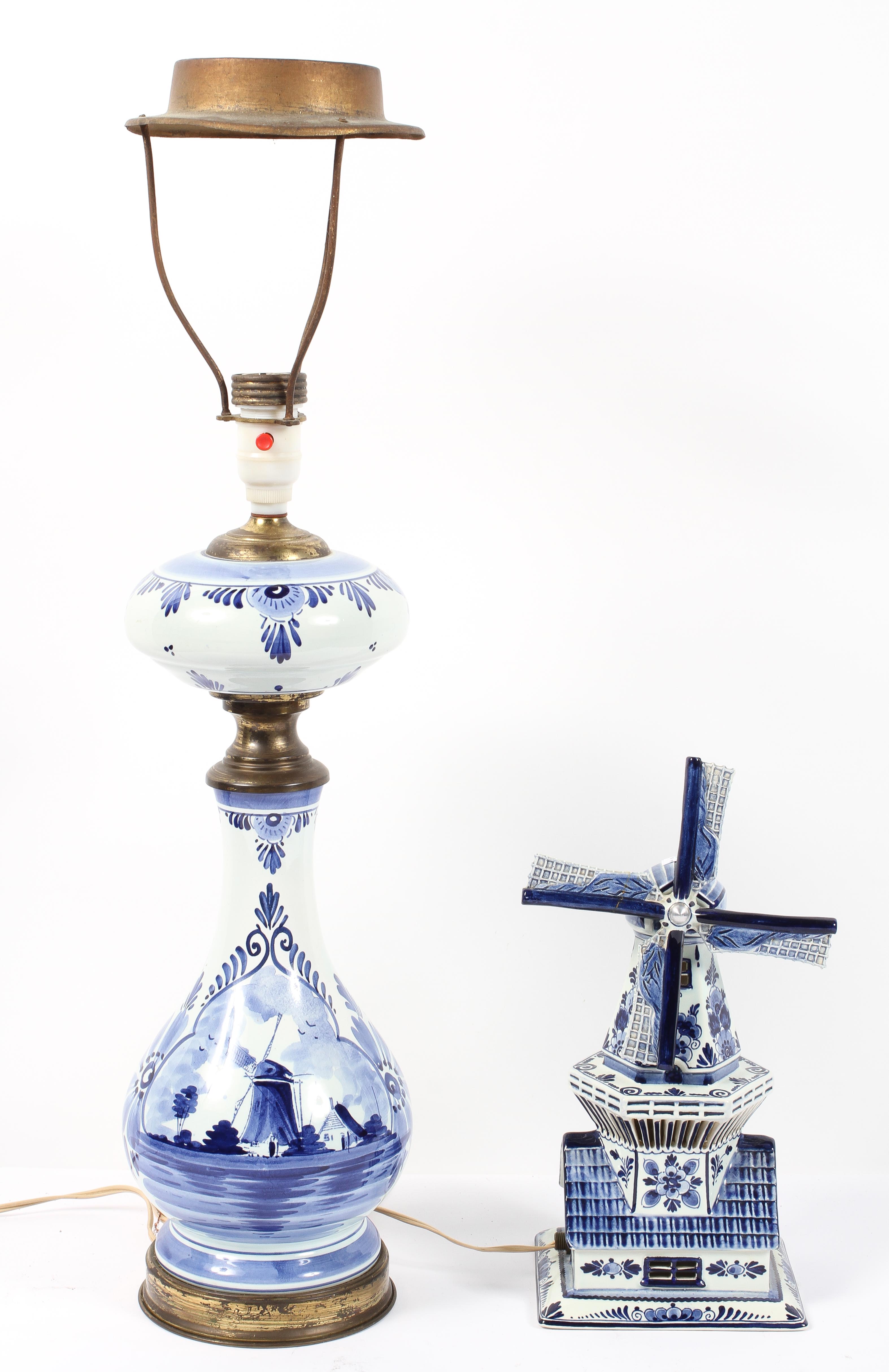 A vintage Delft Blue and white hand painted night light modelled as a windmill,