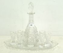 A cut glass liqueur set, comprising a decanter,