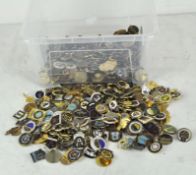 A large quantity of enamelled and gilt metal pin badges (one box)