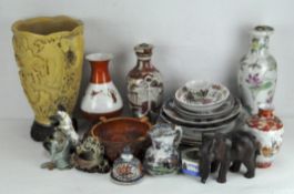 A group of Asian ceramics, comprising two lamp bases, assorted plates, jugs,