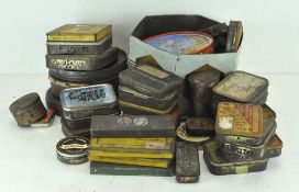 A large collection of 20th century metal tins, for sweets, tobacco, commemorative examples and more,