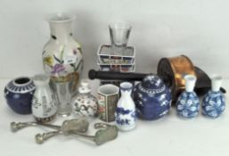 A collection of Oriental ceramics, including a Famille rose style vase, painted floral vase,