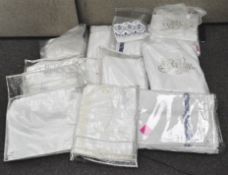 A large quantity of fine quality linen including bed linen and tablecloths,