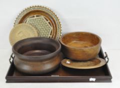 A group of turned wooden bowls,