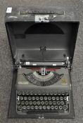 An early 20th century John Moore & Beeson typewriter in original box