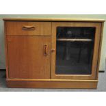 A late 1980's/early 1990's G-Plan media cabinet with one drawer above a single door