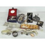 A large quantity of costume jewellery, to include a Wedgwood brooch,