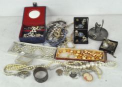 A large quantity of costume jewellery, to include a Wedgwood brooch,