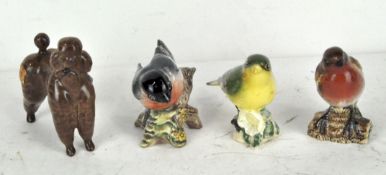 Four Beswick figures, comprising a robin, greenfinch and bullfinch,