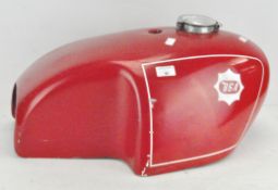 A BSA motorcycle cafe racer tank in red,