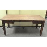 A large wooden desk, the rectangular top with metal handled drawers either side,