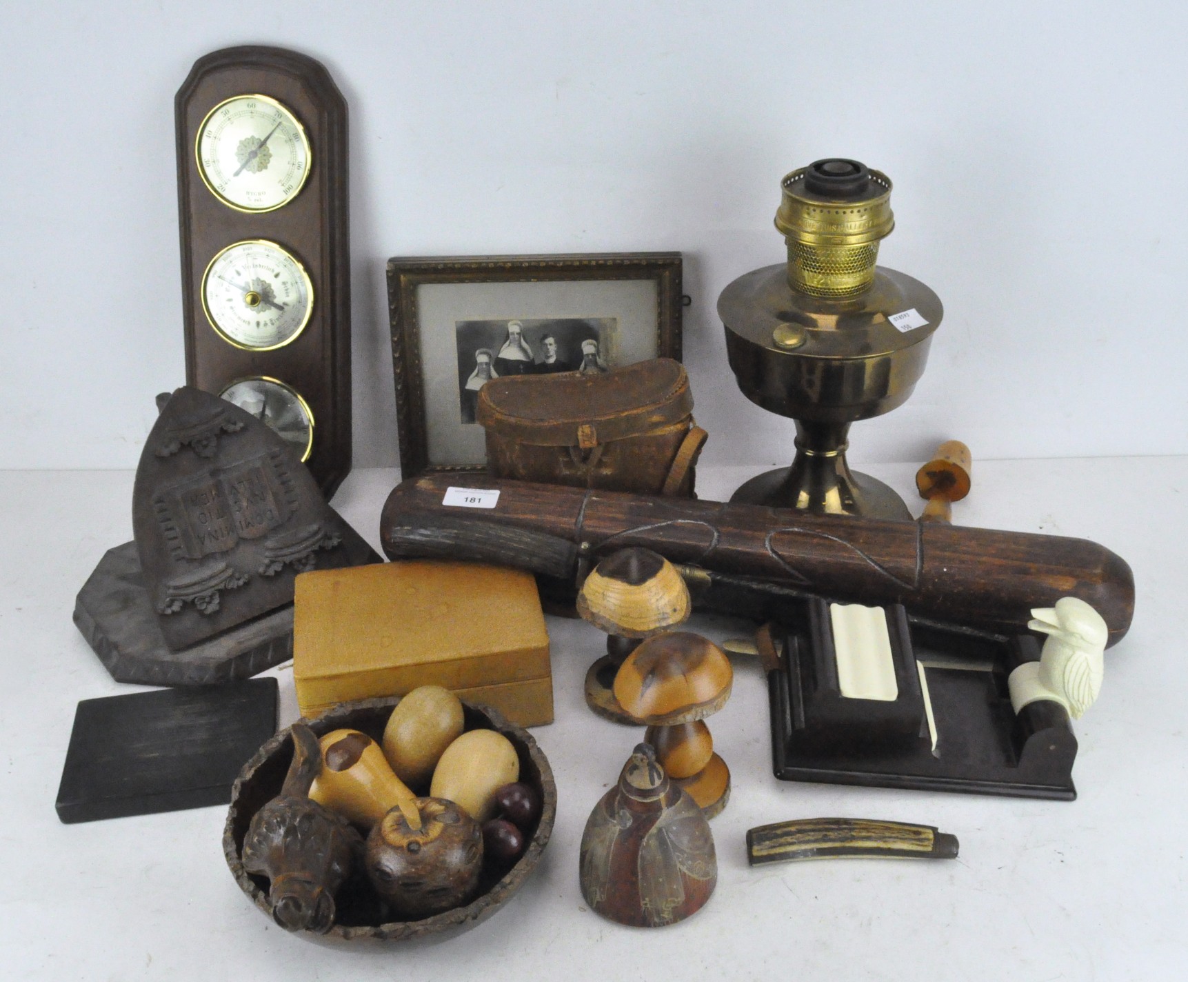 A large horn handled knife, together with a brass oil lamp, mounted thermometer and barometer,