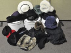 A large collection of assorted hats in various colours and designs,