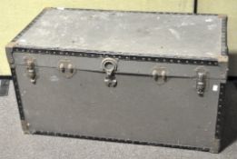 A vintage travelling trunk by 'Over Pond', with studs and metal clasps,
