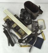A pair of 20th century binoculars, in original leather case,