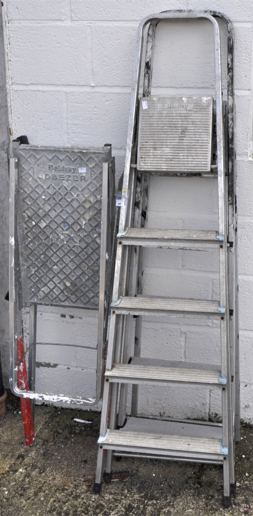 A Beldray five tread step ladder, another similar together with a platform step ladder,